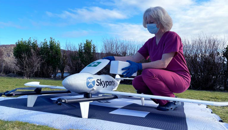 Imge of woman using a medical drone