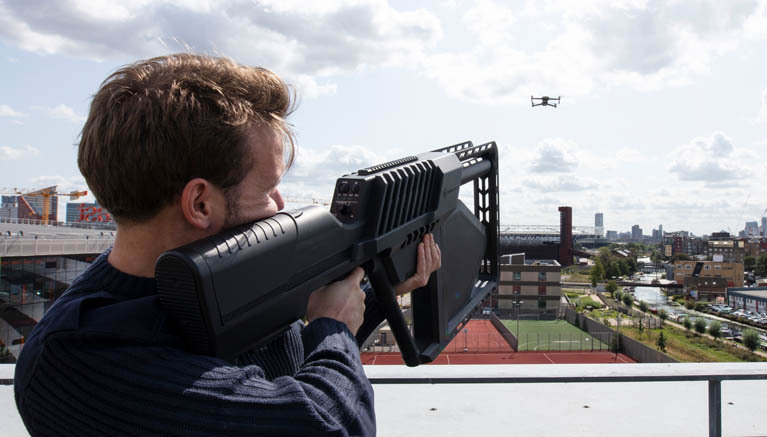 Imge of man using equipment to detect rogue drones